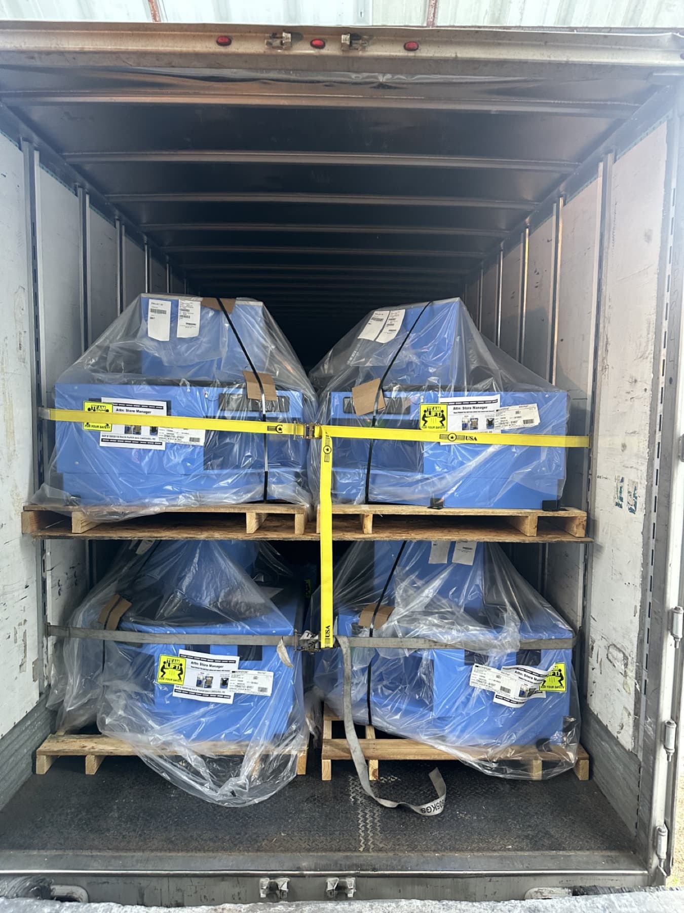 Double-stacked, strapped pallets ready to roll
